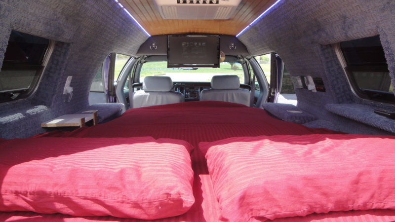 You even get cupholders back there. Cozy!
